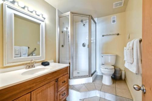 a bathroom with a sink and a shower and a toilet at Oceanfront Getaway - Ocean Views - Fire Pit - BBQ - Beach Access in Carlsbad