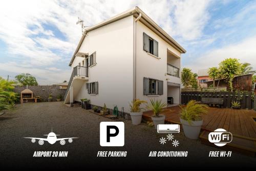 a rendering of a house with a drone on the yard at Évasion Créole à Saint-André II - Parking - Clim in Saint-André