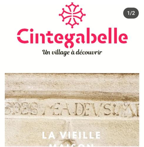 a sign that readsctrashfield in village and downtown la variable museum at Gîte à la Ferme Équestre in Cintegabelle