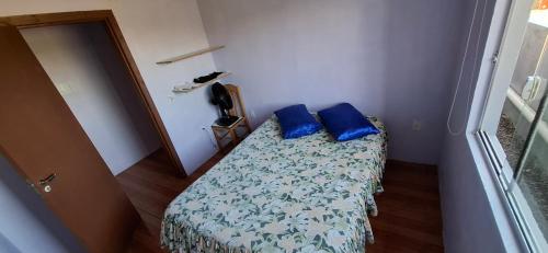 Postel nebo postele na pokoji v ubytování Casa Praia Caravelle