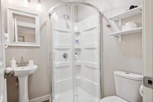 a bathroom with a shower and a toilet and a sink at Judkins Entire Upper Floor - Close to Downtown in Seattle