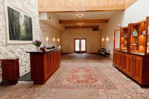 a large room with a rug on the floor at Scribner's Catskill Lodge, a Member of Design Hotels in Hunter