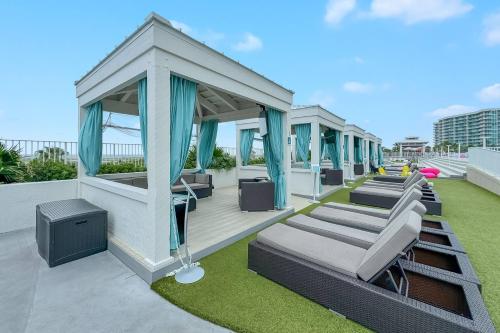 a rendering of a rooftop deck with a gazebo at Caribe D-0404 in Orange Beach