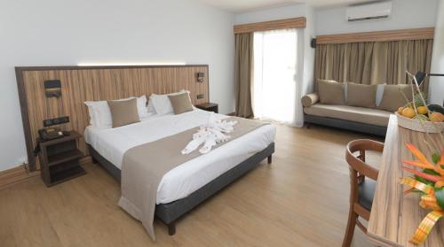 Cama o camas de una habitación en Carayou Hotel & SPA