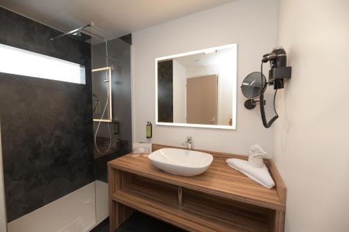 Un baño de Carayou Hotel & SPA