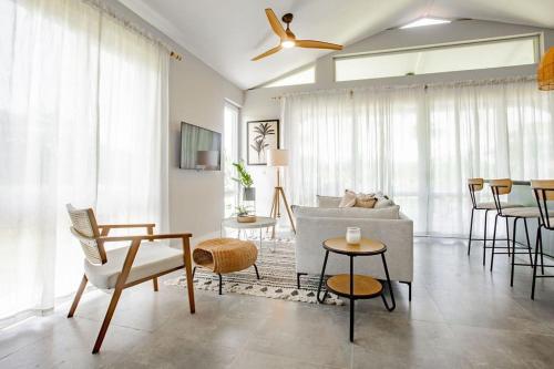 a living room with a couch and a table at Beautiful & Boho 2BR Villa 14 at Playa Venao in Playa Venao