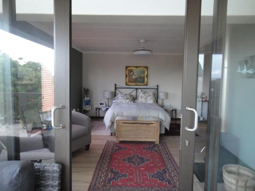 Katil atau katil-katil dalam bilik di Mossel Bay - Holiday Cottage Diaz