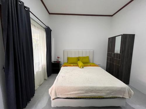 Ένα ή περισσότερα κρεβάτια σε δωμάτιο στο Park side nest studio room 1