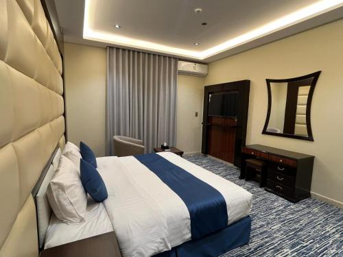 Postel nebo postele na pokoji v ubytování DUBA AlSHAMAL HOTEL - فندق ضباء الشمال