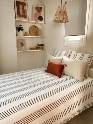 Ein Bett oder Betten in einem Zimmer der Unterkunft -La Casa d'Avignon-
