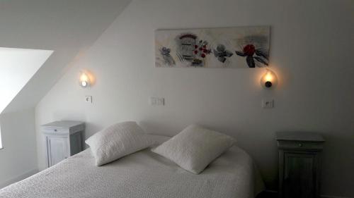 Katil atau katil-katil dalam bilik di Charmant cocon breton proche plage, GR34, parking