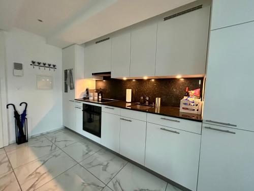 Nhà bếp/bếp nhỏ tại Appartement Hörnli Seeliebe