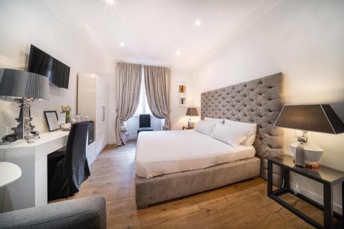 Postel nebo postele na pokoji v ubytování Vatican Chic B&B