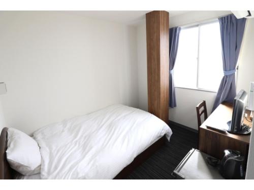 Giường trong phòng chung tại Business Hotel B,loom - Vacation STAY 38186v