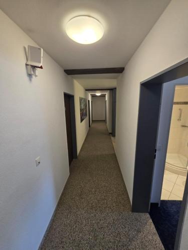 a hallway of an office building with a hallway at Hotel Alt Nürnberg in MHG