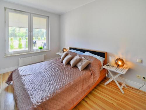 Postel nebo postele na pokoji v ubytování Apartment in Grzybowo near Beach & Cycle Path