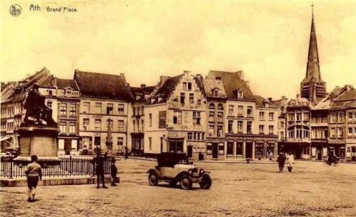 an old photo of a city with a car in the street at Casa Española in Ath