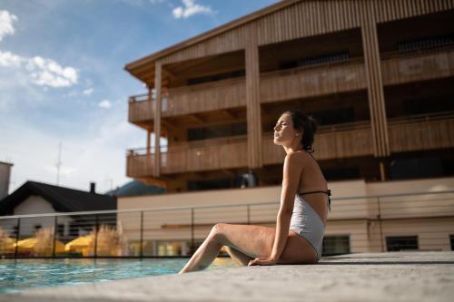 Bazén v ubytování Alpine Nature Hotel Stoll nebo v jeho okolí