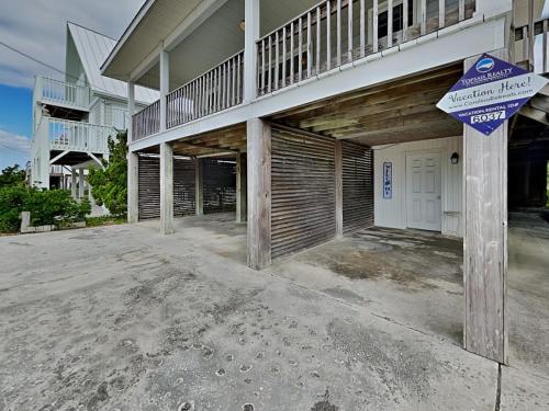 a house with a parking sign in front of it at The Sassy Sea Turtle in Hampstead
