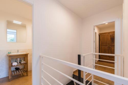 a staircase in a home with white walls at El cuartel - Avila in Villatoro