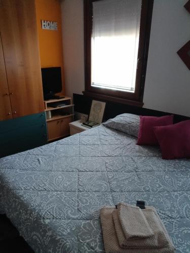 Postel nebo postele na pokoji v ubytování Tirano in relax