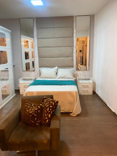 Ένα ή περισσότερα κρεβάτια σε δωμάτιο στο Sala e quarto próx ao Maracanã e Engenhão