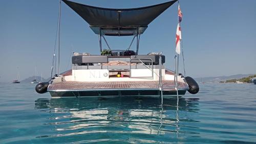 a boat sitting in the water on the water at Casa di Francesca in Rapallo