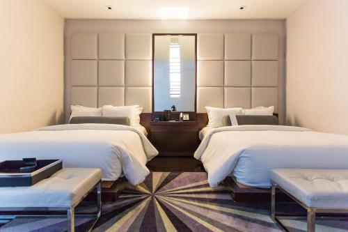 Lova arba lovos apgyvendinimo įstaigoje Ivy Boutique Hotel