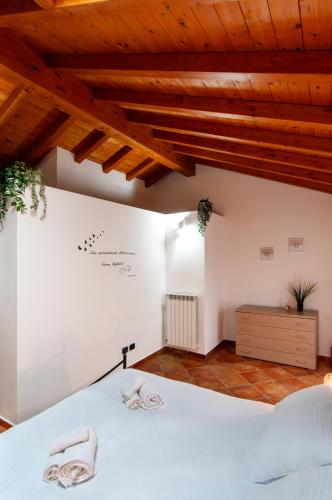 Katil atau katil-katil dalam bilik di Sole Luna Homes - Appartamenti in Corte