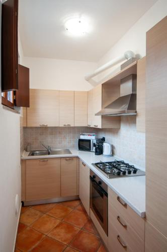 Dapur atau dapur kecil di Sole Luna Homes - Appartamenti in Corte