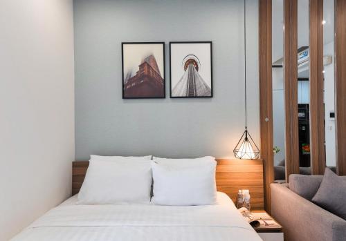 Katil atau katil-katil dalam bilik di Stay With Me Saigon Apartment - Rivergate Building
