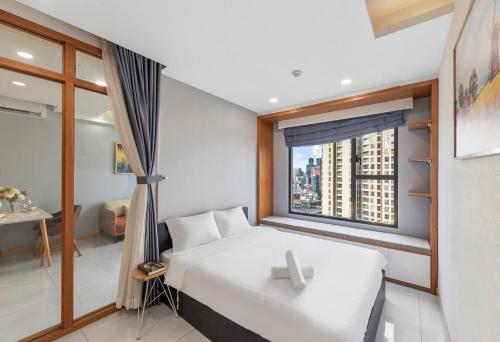 Katil atau katil-katil dalam bilik di Stay With Me Saigon Apartment - Rivergate Building