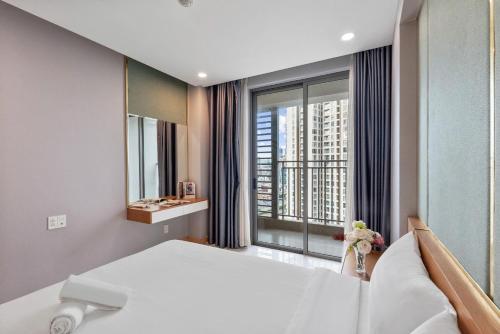 Katil atau katil-katil dalam bilik di Stay With Me Saigon Apartment - Rivergate Building