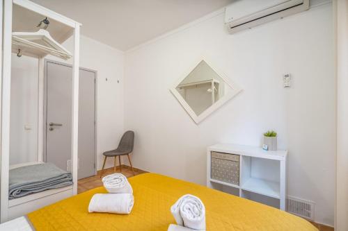Letto o letti in una camera di Ria Guest House