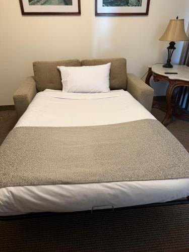 Katil atau katil-katil dalam bilik di Katari Atojja Puno Hotel
