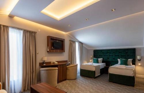 Postel nebo postele na pokoji v ubytování Hotel Garni Ideal