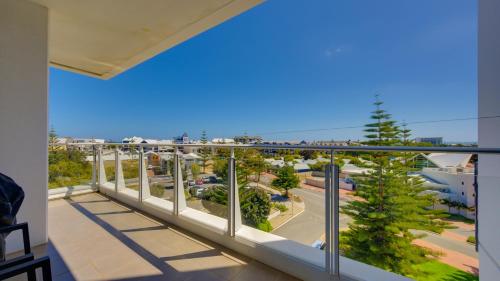 a balcony with a view of a street at Bayview 504 in Mandurah