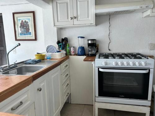 Η κουζίνα ή μικρή κουζίνα στο Acapulco, gro Junto al mar