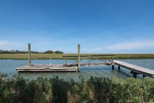 a dock on a body of water at Moonrise Point in Edisto Island