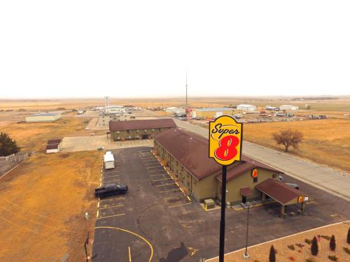 an overhead view of a gas station with a sign at Super 8 by Wyndham Colby in Colby