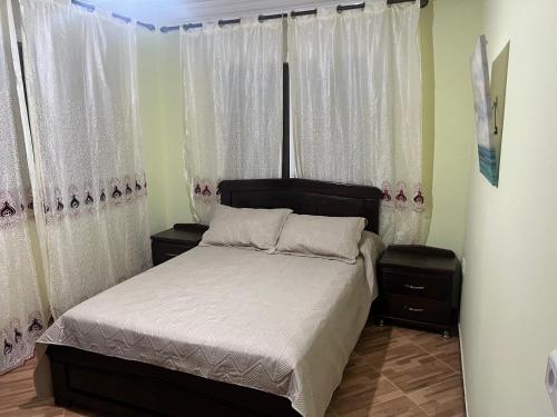 Katil atau katil-katil dalam bilik di Apartamiento con vistas al mar 2