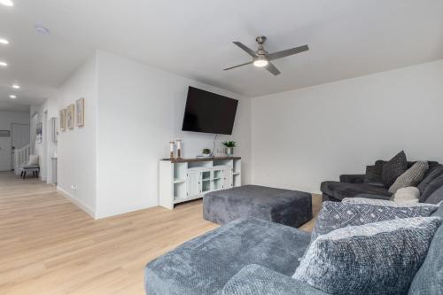 a living room with two couches and a flat screen tv at San Michelle Luxury Escape Mesa Pr1348 in Mesa