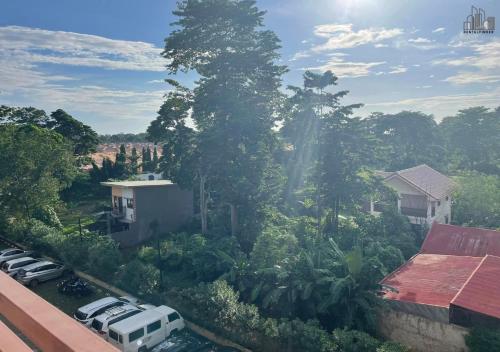 an aerial view of a forest of trees with a train at Palawan Luxury 2BR Condo with Pool, Gym & Parking - B1 5Kunzite in Puerto Princesa City