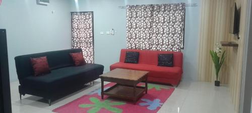 Un lugar para sentarse en Hasmatullah Holiday Apartments