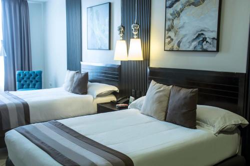 Voodi või voodid majutusasutuse Hotel Las Cascadas toas