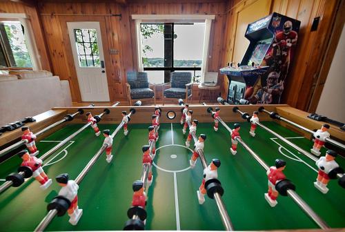 a group of people playing a game of bowling at Lake Hickory Trio 3BR Blue Unit in Hickory
