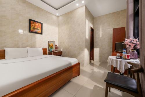 Ένα ή περισσότερα κρεβάτια σε δωμάτιο στο KLY Hotel