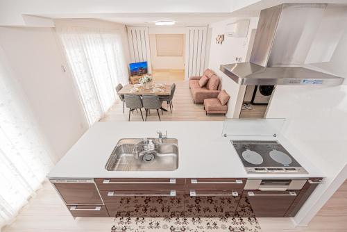 an overhead view of a kitchen with a sink at New Open! Collab House 富士山眺望 送迎無料 BBQ 器具無料貸出 in Fujikawaguchiko