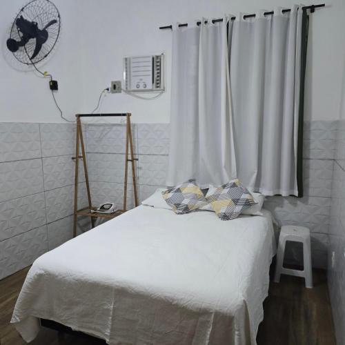 Ένα ή περισσότερα κρεβάτια σε δωμάτιο στο Casa para 8 pessoas Rio de Janeiro Tijuca