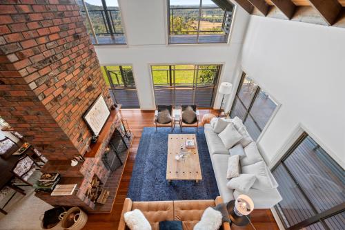 an overhead view of a living room with a couch at Cloud Valley Estate -Chalet in Bowraville